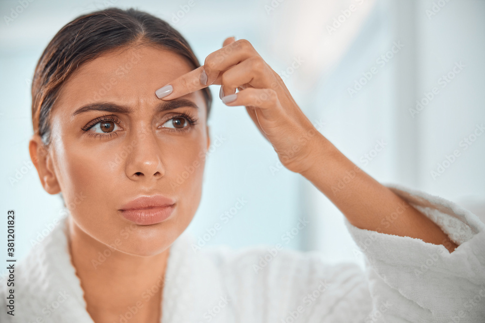 Beautiful healthy smiling caucasian woman is doing beauty procedures at spa and healthcare salon Beautiful healthy smiling caucasian woman is doing beauty procedures at spa and healthcare salon