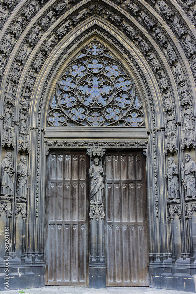 Saints Statues at central portal of western facade of Saint-Ouen-de-Rouen. Rouen Saint-Ouen Abbey Church (Abbatiale Saint-Ouen, 1318 - 1537) - Gothic Roman Catholic church in Rouen, Normandy, France.