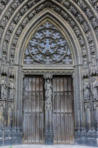 Saints Statues at central portal of western facade of Saint-Ouen-de-Rouen. Rouen Saint-Ouen Abbey Church (Abbatiale Saint-Ouen, 1318 - 1537) - Gothic Roman Catholic church in Rouen, Normandy, France.
