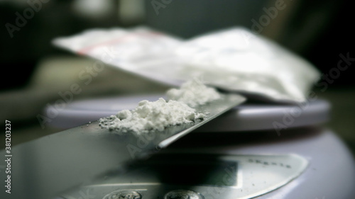Measuring Cocaine powder on digital scales