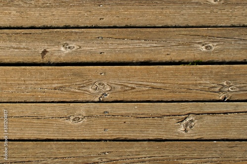 Old sandy wooden board pathway. Wood plank texture
