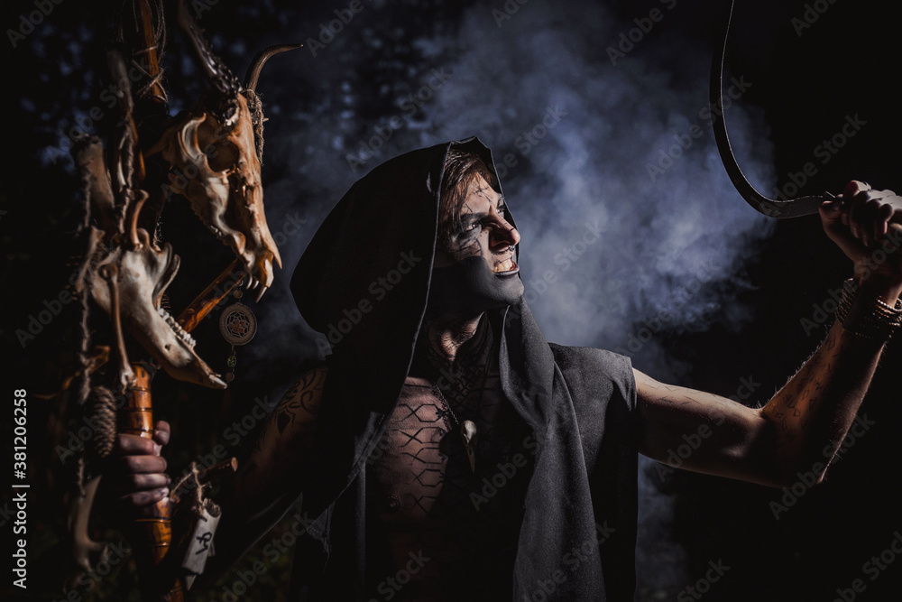 Fototapeta premium Kodun with marks on the body in the forest