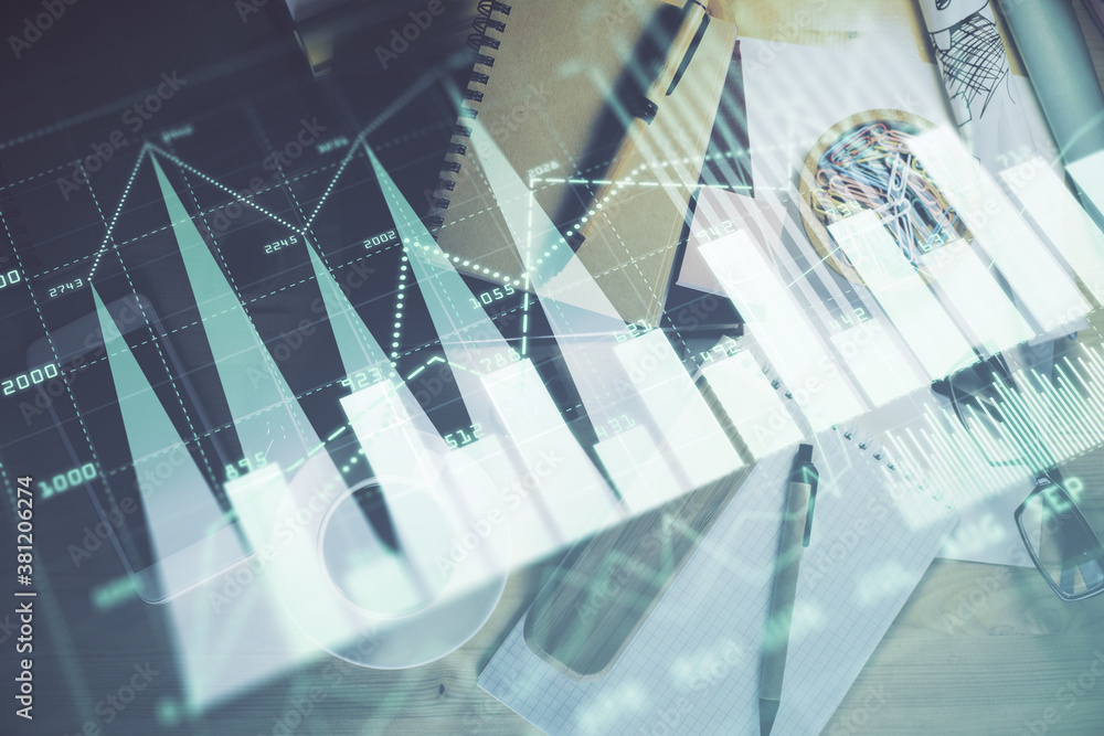 Double exposure of forex graph drawing and work table top veiw. Concept of financial analysis. Double exposure of forex graph drawing and work table top veiw. Concept of financial analysis.
