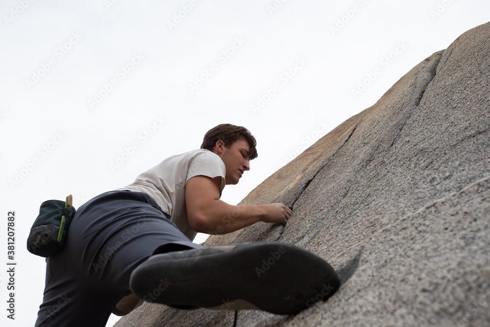 Man rock climbing Man rock climbing