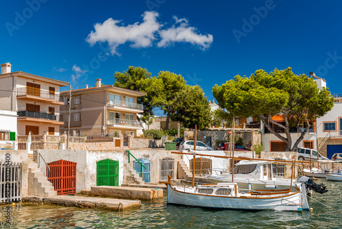 Boats in front of the old boathouses in Portocolom - 3687