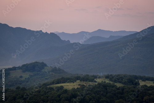 Early morning one hour before dawn. Silhouettes of mountains in the morning haze. Lagonaki Plateau, Republic of Adygea, Russia © Alexey Oblov
