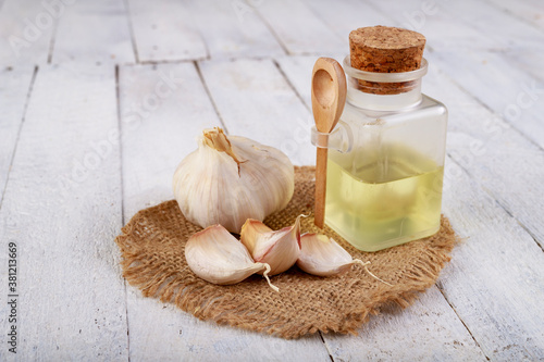 Fresh garlic and squeezed flu juice. Home remedies to cure infections and colds. photo