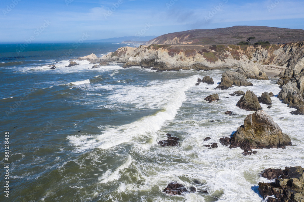 The Pacific Ocean crashes against the rugged and scenic seashore of Northern California. This region, north of San Francisco, is known for its amazing coastal landscapes that extend to Oregon.