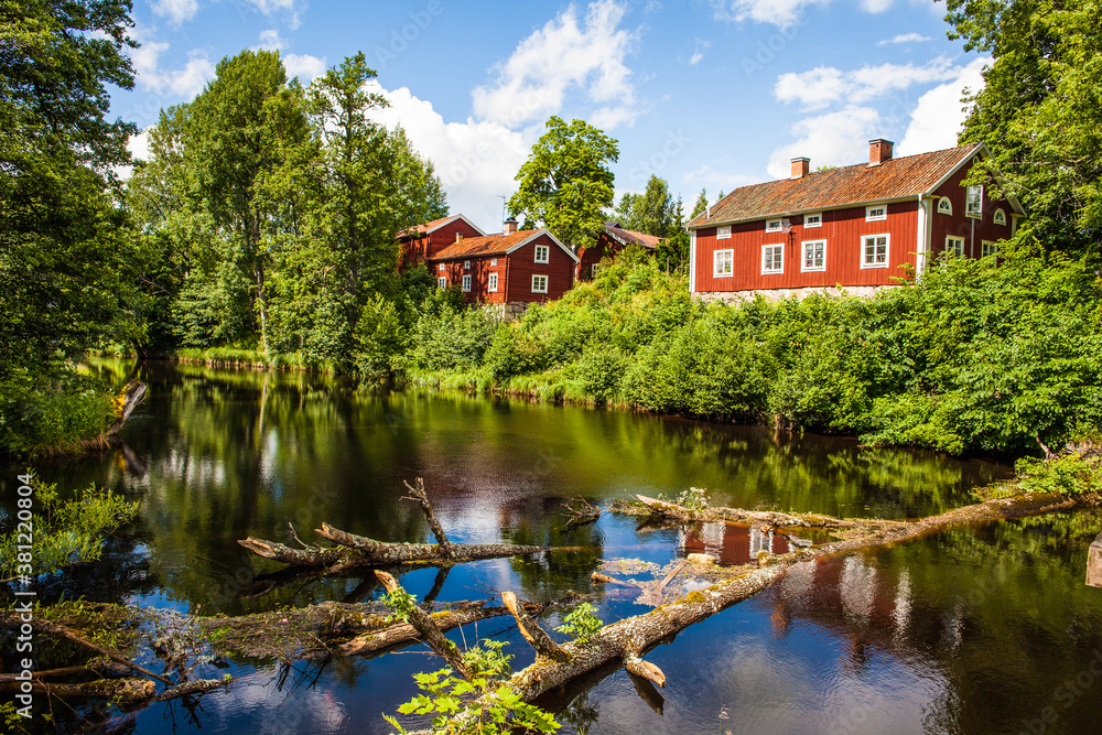 A red Swedish traditional house on the countryside in Sweden A red Swedish traditional house on the countryside in Sweden