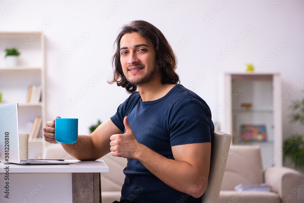 Young man employee working from house Young man employee working from house