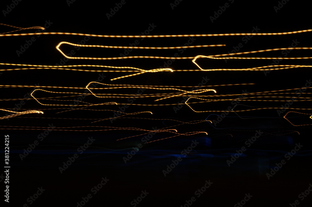 Golden threads, yellow neon signs on a black background. - obrazy, fototapety, plakaty 