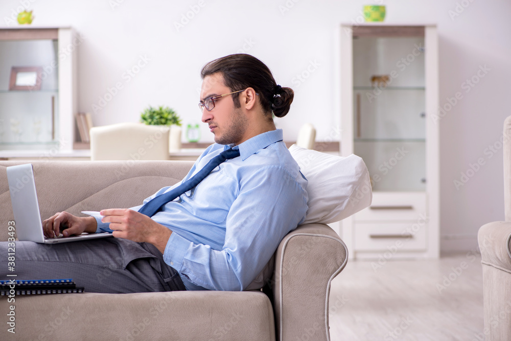 Tired businessman employee working from home Tired businessman employee working from home