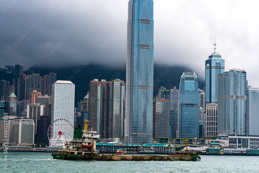Fototapeta premium Hong Kong - March 26 2020 : Hong Kong cityscape and skyscraper modern building, view from mountains of Hong Kong