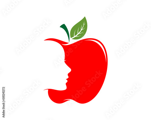 Woman face inside the red apple