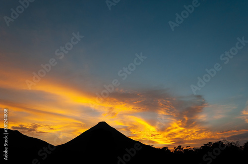 Silhouette of the Arenal volcano at sunset with copy space, La Fortuna, Costa Rica.