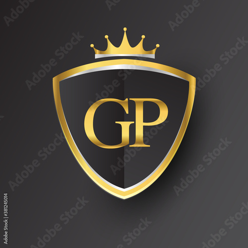Initial logo letter GP with shield and crown Icon golden color isolated on black background, logotype design for company identity.
