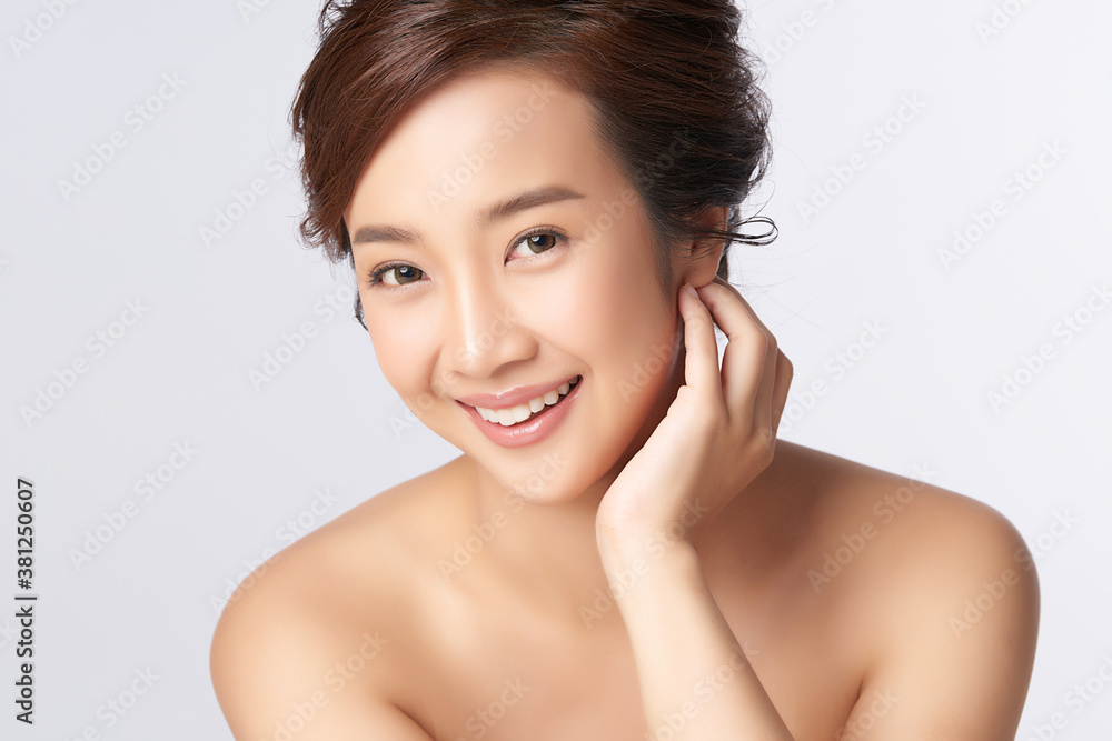 Beautiful young asian woman with clean fresh skin on white background, Face care, Facial treatment, Cosmetology, beauty and spa, Asian women portrait Beautiful young asian woman with clean fresh skin on white background, Face care, Facial treatment, Cosmetology, beauty and spa, Asian women portrait