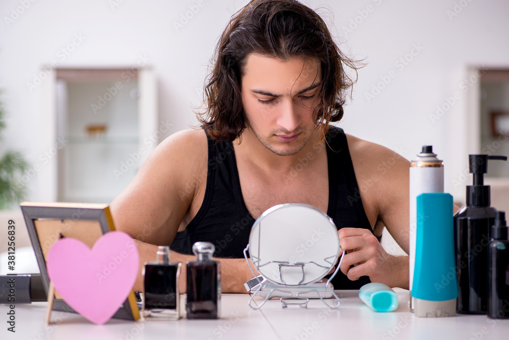 Young handsome man preparing for date