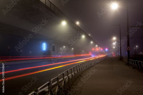 Busy street with fog