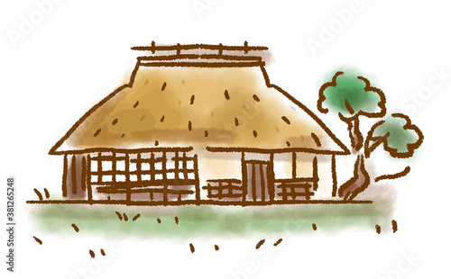 味のある水彩画風の茅葺き屋根の家のイラスト