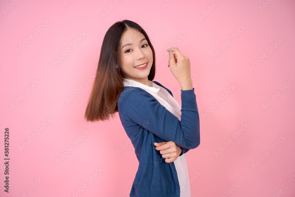Asian woman refreshing on pink background. Asian woman refreshing on pink background.
