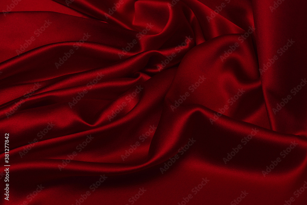 Red silk or satin luxury fabric texture can use as abstract background. Red silk or satin luxury fabric texture can use as abstract background.