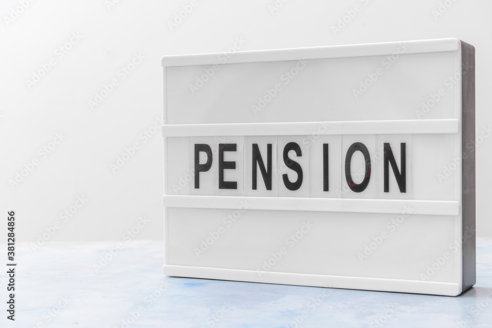 Board with word PENSION on light background Board with word PENSION on light background