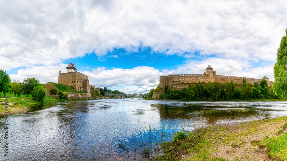Panoramic view of Narva Castle in Estonia and Ivangorod Castle in Russia