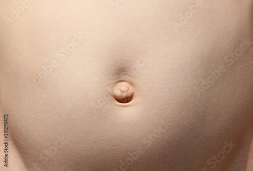 Belly button. the child's stomach. photo