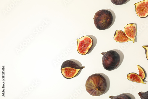 Flat lay with fig fruits on white background