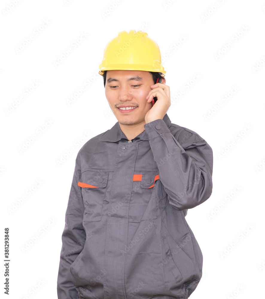 Migrant worker wearing yellow helmet is calling Migrant worker wearing yellow helmet is calling