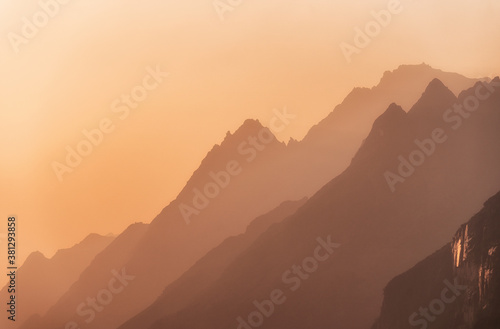 Mountain landscapes of Abkhazia. Bright calm sunset over the Caucasus mountains