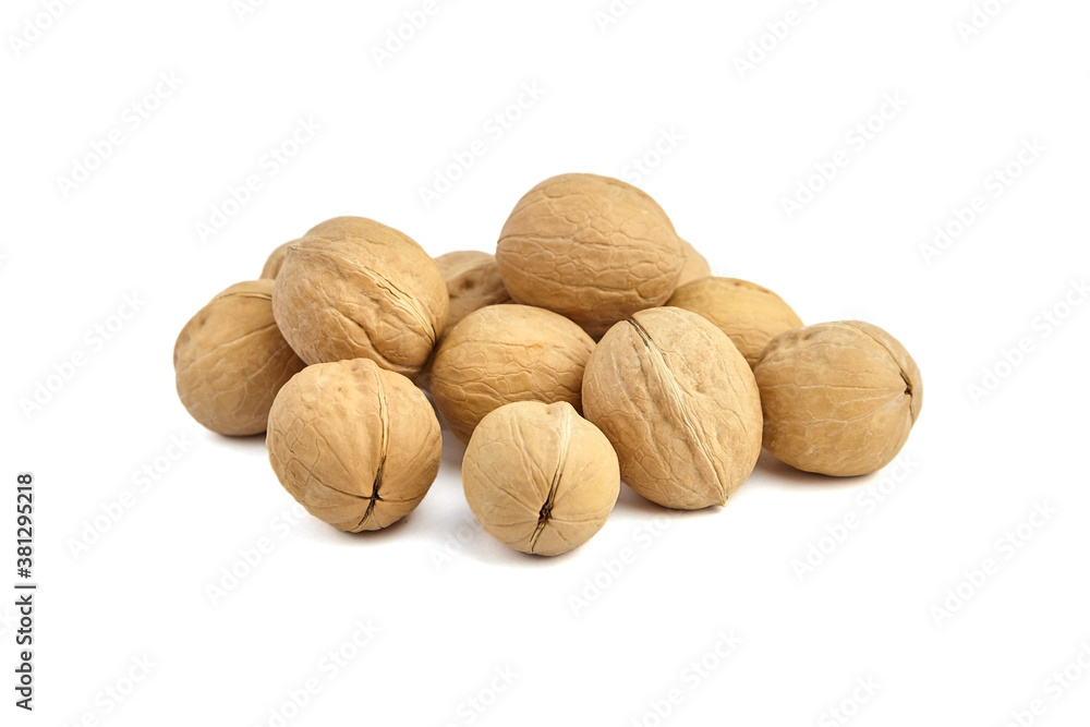 Walnuts heap isolated on white background Walnuts heap isolated on white background