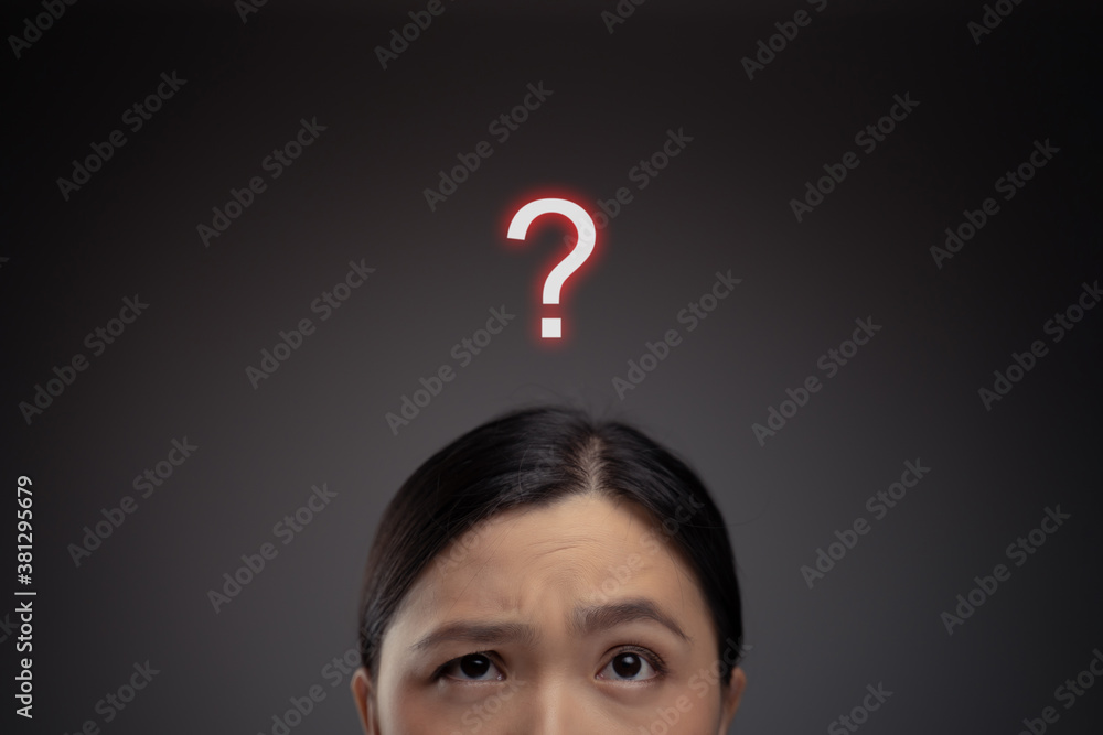 Asian woman confused and question mark icon hologram effect. Asian woman confused and question mark icon hologram effect.