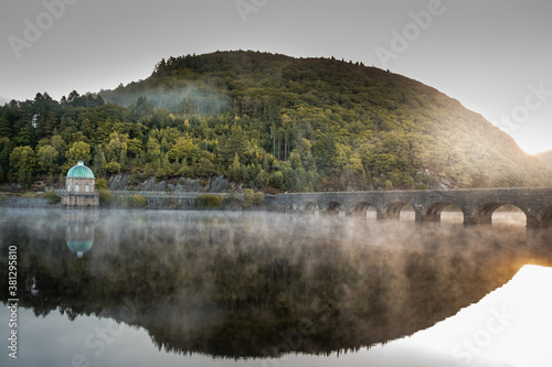 Elan valley in Mid Wales in the morning mist at sunrise.