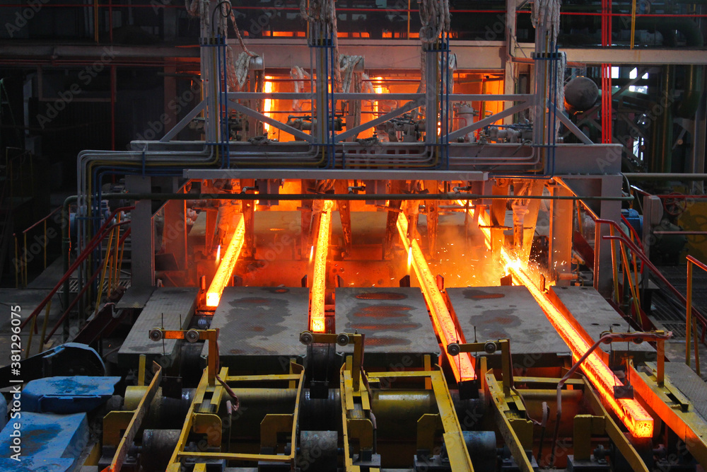 Red hot steel metal billets after molten steel casting.  Continuous casting machine. Background of the blacksmith and metallurgical industry. - obrazy, fototapety, plakaty 