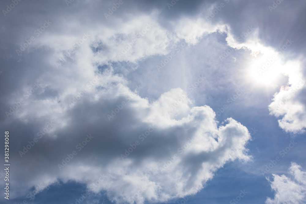 Thick cloud cover blue sky, little shade of sunlight