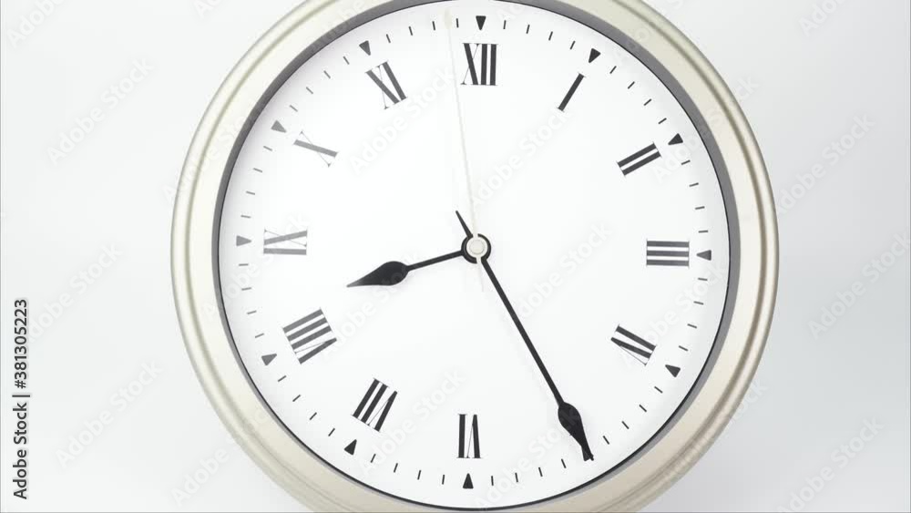 Eight o'clock classic Face With Roman Numerals, Time lapse 60 minutes. Eight o'clock classic Face With Roman Numerals, Time lapse 60 minutes.