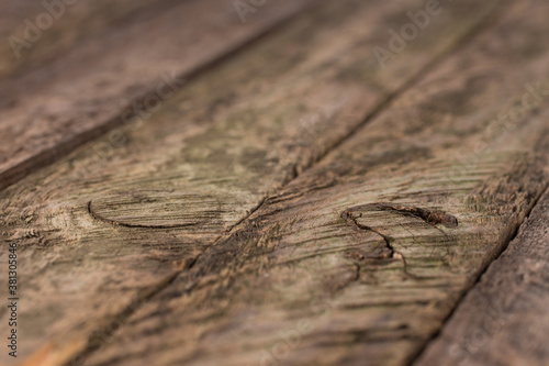 Old wooden plank background with selective focus. 