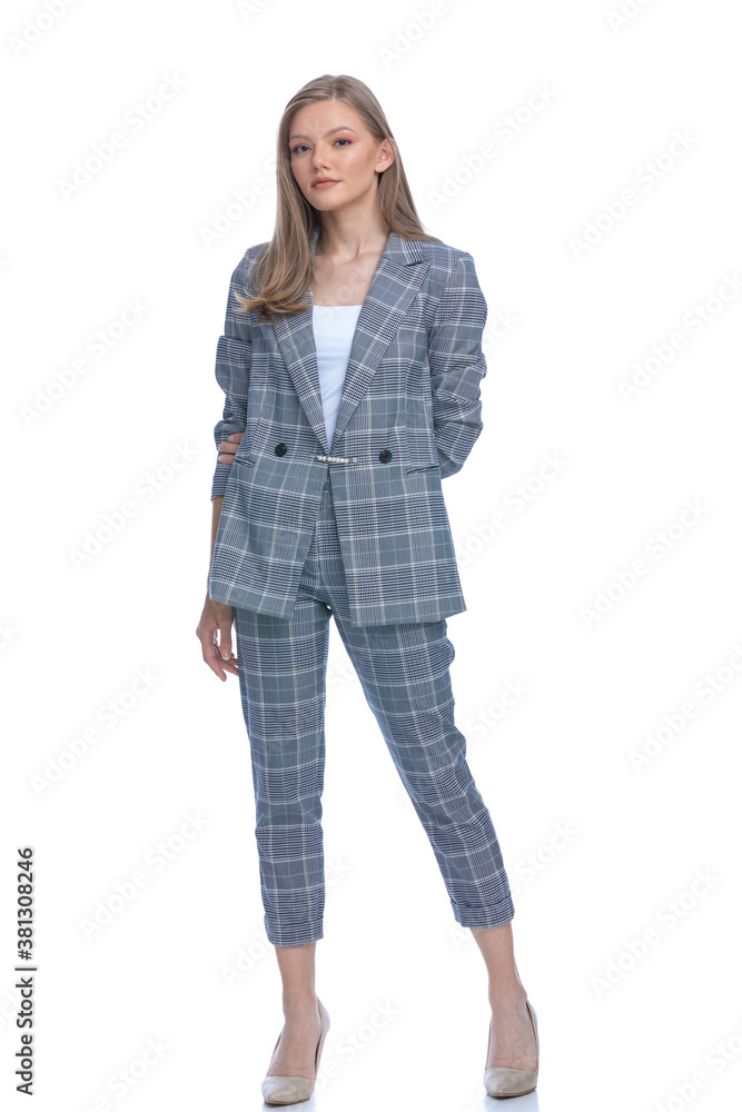 sexy young businesswoman wearing blue checkered suit sexy young businesswoman wearing blue checkered suit