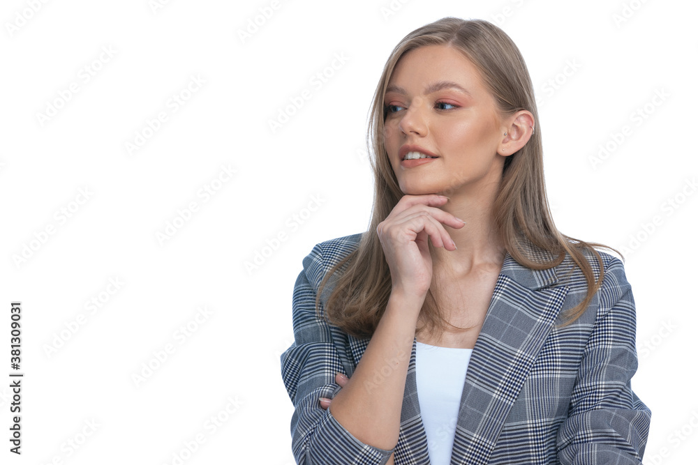 young businesswoman touching chin and thinking young businesswoman touching chin and thinking