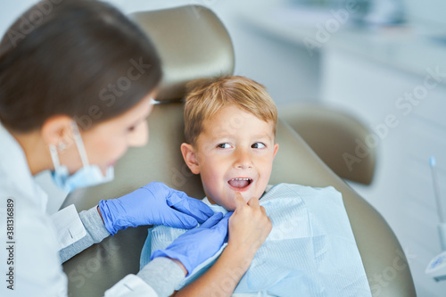 Little boy and female dentist in the dentists office