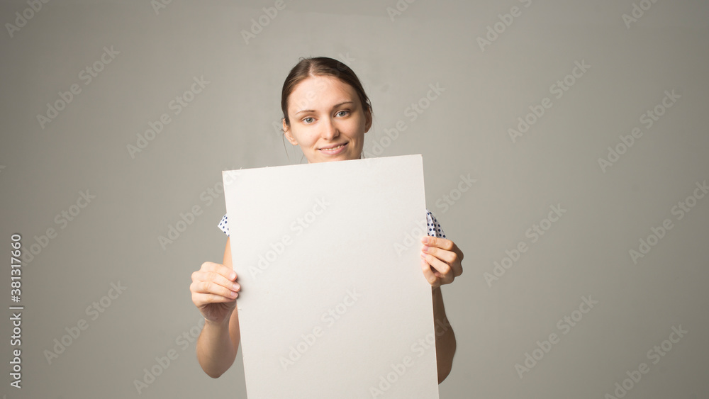 Girl holding blank sign Girl holding blank sign
