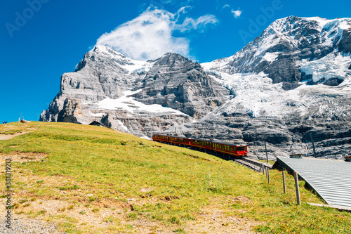 Snowy mountain and train at Jungfrau Eigergletscher in Switzerland