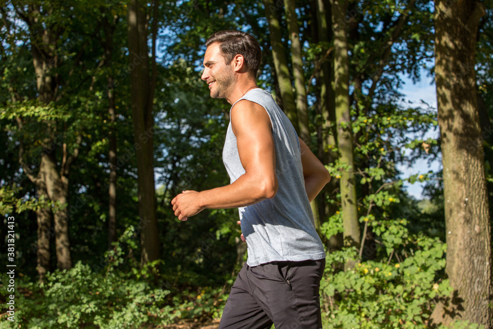 Handsome man jogging in the nature Handsome man jogging in the nature