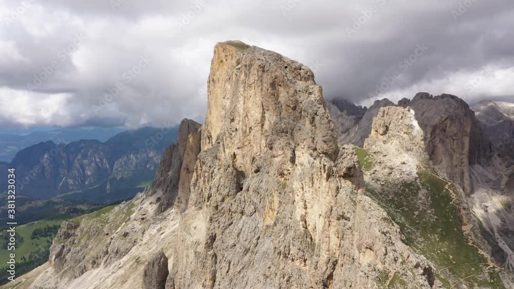 Rotating drone shot flying around jagged peak in the spectacular Dolomites mountain ranges, panoramic natural landscape in Italy Europe
Rotating drone shot flying around jagged peak in the spectacular Dolomites mountain ranges, panoramic natural landscape in Italy Europe