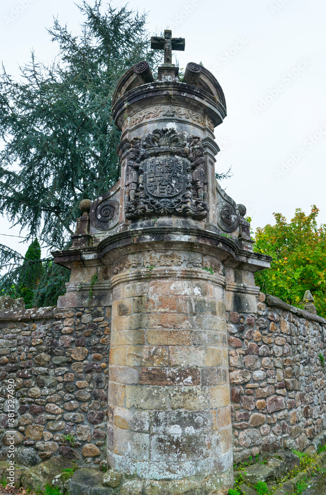 Shield carved in stone with the arms of Miera, Rubalcaba, Velasco, Riba and Agüero. Cruz de Rubalcaba in the town of Rubalcaba, Liérganes, Valles Pasiegos, Cantabria, Spain