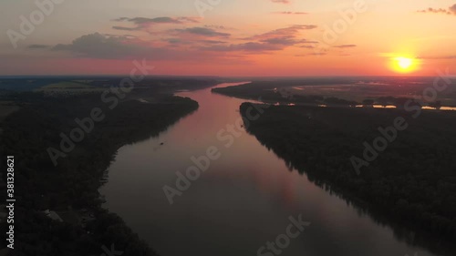 Aerial view of big siberian Ob river in beauty summer sunset, 4K drone footage.