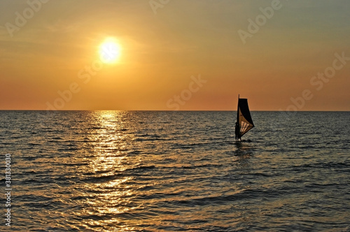 Windsurf board at sunset off the coast of Phu Quoc Island, Vietnam