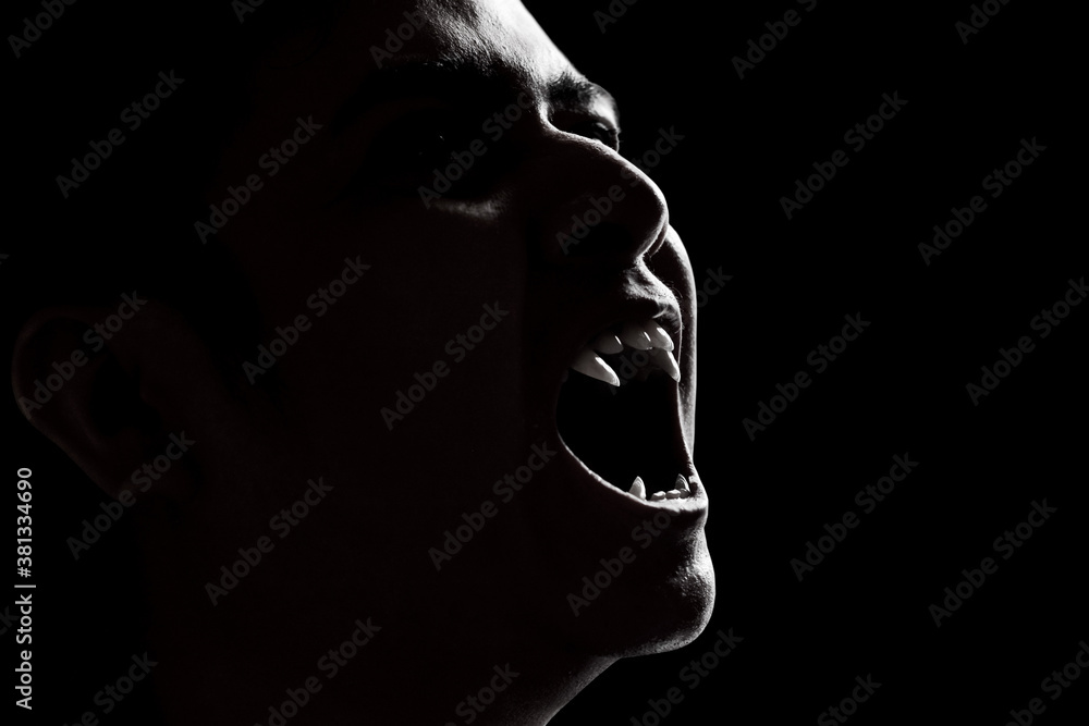 Fototapeta premium Scary vampire man on dark background